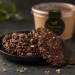 VegGora Midnight Crunch Clusters made with vegan dark chocolate, puffed quinoa, pumpkin seeds and melon seeds